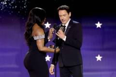 SANTA MONICA, CALIFORNIA - JANUARY 14: (L-R) Angela Bassett presents Robert Downey Jr. with the Best Supporting Actor Award for 'Oppenheimer' onstage during the 29th Annual Critics Choice Awards at Barker Hangar on January 14, 2024 in Santa Monica, California. (Photo by Kevin Winter/Getty Images for Critics Choice Association)