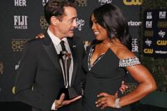 SANTA MONICA, CALIFORNIA - JANUARY 14: (L-R) Robert Downey Jr., winner of the Best Supporting Actor Award for 'Oppenheimer,' and Angela Bassett pose in the press room during the 29th Annual Critics Choice Awards at Barker Hangar on January 14, 2024 in Santa Monica, California. (Photo by Kevin Mazur/Getty Images for Critics Choice Association)