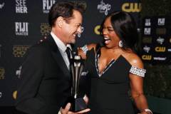SANTA MONICA, CALIFORNIA - JANUARY 14: (L-R) Robert Downey Jr., winner of the Best Supporting Actor Award for 'Oppenheimer,' and Angela Bassett pose in the press room during the 29th Annual Critics Choice Awards at Barker Hangar on January 14, 2024 in Santa Monica, California. (Photo by Kevin Mazur/Getty Images for Critics Choice Association)
