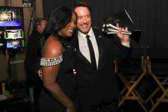 SANTA MONICA, CALIFORNIA - JANUARY 14: (L-R) Angela Bassett and Robert Downey Jr., winner of the Best Supporting Actor Award for 'Oppenheimer,' pose backstage during the 29th Annual Critics Choice Awards at Barker Hangar on January 14, 2024 in Santa Monica, California. (Photo by Kevin Mazur/Getty Images for Critics Choice Association)