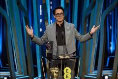 LONDON, ENGLAND - FEBRUARY 18: Robert Downey Jr. accepts the Supporting Actor Award for 'Oppenheimer' on stage during the EE BAFTA Film Awards 2024 at The Royal Festival Hall on February 18, 2024 in London, England. (Photo by Kate Green/BAFTA/Getty Images for BAFTA)