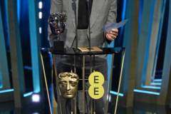 LONDON, ENGLAND - FEBRUARY 18: Robert Downey Jr. accepts the Supporting Actor Award for 'Oppenheimer' on stage during the EE BAFTA Film Awards 2024 at The Royal Festival Hall on February 18, 2024 in London, England. (Photo by Kate Green/BAFTA/Getty Images for BAFTA)