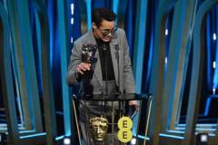 LONDON, ENGLAND - FEBRUARY 18: Robert Downey Jr. accepts the Supporting Actor Award for 'Oppenheimer' on stage during the EE BAFTA Film Awards 2024 at The Royal Festival Hall on February 18, 2024 in London, England. (Photo by Kate Green/BAFTA/Getty Images for BAFTA)