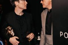 LONDON, ENGLAND - FEBRUARY 18: Cillian Murphy and Robert Downey Jr. backstage during the EE BAFTA Film Awards 2024 at The Royal Festival Hall on February 18, 2024 in London, England. (Photo by Rowben Lantion/BAFTA via Getty Images)