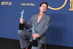 Robert Downey Jr. poses the awards for Outstanding Performance by a Male Actor in a Leading Role in a Motion Picture and Outstanding Performance by a Cast in a Motion Picture for "Oppenheimer" at the 30th Annual Screen Actors Guild Awards held at the Shrine Auditorium and Expo Hall on February 24, 2024 in Los Angeles, California. (Photo by Gilbert Flores/Variety via Getty Images)