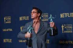 Los Angeles, CA - February 24: Robert Downey, Jr., winner in the Male Actor in a Supporting Role - Motion Picture and Motion Picture Ensemble categories in the deadline room at the 30th Screen Actors Guild Awards in Shrine Auditorium and Expo Hall in Los Angeles, CA, Saturday, Feb. 24, 2024. (Mel Melcon / Los Angeles Times via Getty Images)