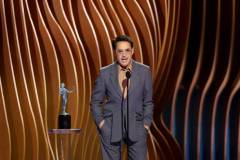 LOS ANGELES, CALIFORNIA - FEBRUARY 24: Robert Downey Jr. accepts the Outstanding Performance by a Male Actor in a Supporting Role in a Motion Picture award for ?Oppenheimer? onstage during the 30th Annual Screen Actors Guild Awards at Shrine Auditorium and Expo Hall on February 24, 2024 in Los Angeles, California. (Photo by Matt Winkelmeyer/Getty Images)