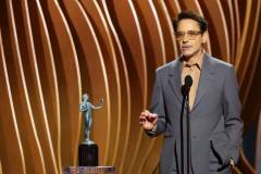 LOS ANGELES, CALIFORNIA - FEBRUARY 24: Robert Downey Jr. accepts the Outstanding Performance by a Male Actor in a Supporting Role in a Motion Picture award for ?Oppenheimer? onstage during the 30th Annual Screen Actors Guild Awards at Shrine Auditorium and Expo Hall on February 24, 2024 in Los Angeles, California. (Photo by Matt Winkelmeyer/Getty Images)