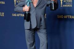LOS ANGELES, CALIFORNIA - FEBRUARY 24: Robert Downey Jr., winner of the Outstanding Performance by a Male Actor in a Supporting Role award and the Outstanding Performance by a Cast in a Motion Picture award for 'Oppenheimer' poses in the press room during the 30th Annual Screen Actors Guild Awards at Shrine Auditorium and Expo Hall on February 24, 2024 in Los Angeles, California. (Photo by Frazer Harrison/Getty Images)