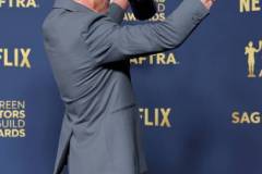 LOS ANGELES, CALIFORNIA - FEBRUARY 24: Robert Downey Jr., winner of the Outstanding Performance by a Male Actor in a Supporting Role award and the Outstanding Performance by a Cast in a Motion Picture award for 'Oppenheimer' poses in the press room during the 30th Annual Screen Actors Guild Awards at Shrine Auditorium and Expo Hall on February 24, 2024 in Los Angeles, California. (Photo by Amy Sussman/WireImage)
