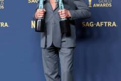 LOS ANGELES, CALIFORNIA - FEBRUARY 24: Robert Downey Jr., winner of the Outstanding Performance by a Male Actor in a Supporting Role award and the Outstanding Performance by a Cast in a Motion Picture award for 'Oppenheimer' poses in the press room during the 30th Annual Screen Actors Guild Awards at Shrine Auditorium and Expo Hall on February 24, 2024 in Los Angeles, California. (Photo by Amy Sussman/WireImage)