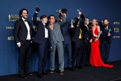 LOS ANGELES, CALIFORNIA - FEBRUARY 24: (L-R) Benny Safdie, Cillian Murphy, Robert Downey Jr., Josh Hartnett, Alden Ehrenreich, Casey Affleck, Emily Blunt and Kenneth Branagh, winner of the Outstanding Performance by a Cast in a Motion Picture award for 'Oppenheimer' pose in the press room during the 30th Annual Screen Actors Guild Awards at Shrine Auditorium and Expo Hall on February 24, 2024 in Los Angeles, California. (Photo by Frazer Harrison/Getty Images)
