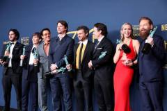 LOS ANGELES, CALIFORNIA - FEBRUARY 24: (L-R) Benny Safdie, Cillian Murphy, Robert Downey Jr., Josh Hartnett, Alden Ehrenreich, Casey Affleck, Emily Blunt and Kenneth Branagh, winner of the Outstanding Performance by a Cast in a Motion Picture award for 'Oppenheimer' pose in the press room during the 30th Annual Screen Actors Guild Awards at Shrine Auditorium and Expo Hall on February 24, 2024 in Los Angeles, California. (Photo by Amy Sussman/WireImage)