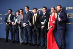 LOS ANGELES, CALIFORNIA - FEBRUARY 24: (L-R) Benny Safdie, Cillian Murphy, Robert Downey Jr., Josh Hartnett, Alden Ehrenreich, Casey Affleck, Emily Blunt and Kenneth Branagh, winner of the Outstanding Performance by a Cast in a Motion Picture award for 'Oppenheimer' pose in the press room during the 30th Annual Screen Actors Guild Awards at Shrine Auditorium and Expo Hall on February 24, 2024 in Los Angeles, California. (Photo by Amy Sussman/WireImage)