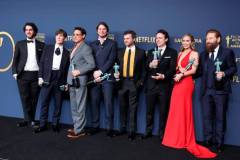 LOS ANGELES, CALIFORNIA - FEBRUARY 24: (L-R) Benny Safdie, Cillian Murphy, Robert Downey Jr., Josh Hartnett, Alden Ehrenreich, Casey Affleck, Emily Blunt and Kenneth Branagh, winner of the Outstanding Performance by a Cast in a Motion Picture award for 'Oppenheimer' pose in the press room during the 30th Annual Screen Actors Guild Awards at Shrine Auditorium and Expo Hall on February 24, 2024 in Los Angeles, California. (Photo by Amy Sussman/WireImage)