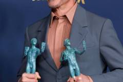 LOS ANGELES, CALIFORNIA - FEBRUARY 24: Robert Downey Jr., winner of the Outstanding Performance by a Male Actor in a Supporting Role award and the Outstanding Performance by a Cast in a Motion Picture award for 'Oppenheimer' poses in the press room during the 30th Annual Screen Actors Guild Awards at Shrine Auditorium and Expo Hall on February 24, 2024 in Los Angeles, California. (Photo by Frazer Harrison/Getty Images)