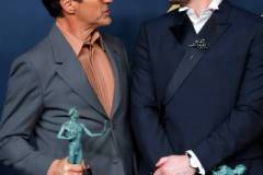 LOS ANGELES, CALIFORNIA - FEBRUARY 24: (L-R) Robert Downey Jr. and Josh Hartnett, winners of the Outstanding Performance by a Cast in a Motion Picture award for 'Oppenheimer' pose in the press room during the 30th Annual Screen Actors Guild Awards at Shrine Auditorium and Expo Hall on February 24, 2024 in Los Angeles, California. (Photo by Frazer Harrison/Getty Images)