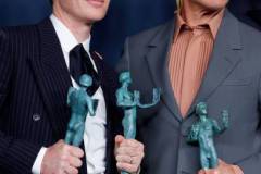 LOS ANGELES, CALIFORNIA - FEBRUARY 24: (L-R) Cillian Murphy and Robert Downey Jr., winners of the Outstanding Performance by a Cast in a Motion Picture award for 'Oppenheimer' pose in the press room during the 30th Annual Screen Actors Guild Awards at Shrine Auditorium and Expo Hall on February 24, 2024 in Los Angeles, California. (Photo by Frazer Harrison/Getty Images)