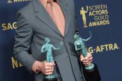 LOS ANGELES, CALIFORNIA - FEBRUARY 24: Robert Downey Jr., winner of the Outstanding Performance by a Male Actor in a Supporting Role award and the Outstanding Performance by a Cast in a Motion Picture award for 'Oppenheimer' poses in the press room during the 30th Annual Screen Actors Guild Awards at Shrine Auditorium and Expo Hall on February 24, 2024 in Los Angeles, California.  (Photo by Monica Schipper/FilmMagic)