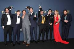 LOS ANGELES, CALIFORNIA - FEBRUARY 24: (L-R) Benny Safdie, Cillian Murphy, Robert Downey Jr., Josh Hartnett, Alden Ehrenreich, Casey Affleck, Emily Blunt and Kenneth Branagh, winner of the Outstanding Performance by a Cast in a Motion Picture award for 'Oppenheimer' pose in the press room during the 30th Annual Screen Actors Guild Awards at Shrine Auditorium and Expo Hall on February 24, 2024 in Los Angeles, California.  (Photo by Monica Schipper/FilmMagic)
