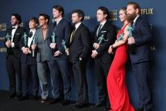 LOS ANGELES, CALIFORNIA - FEBRUARY 24: (L-R) Benny Safdie, Cillian Murphy, Robert Downey Jr., Josh Hartnett, Alden Ehrenreich, Casey Affleck, Emily Blunt and Kenneth Branagh, winner of the Outstanding Performance by a Cast in a Motion Picture award for 'Oppenheimer' pose in the press room during the 30th Annual Screen Actors Guild Awards at Shrine Auditorium and Expo Hall on February 24, 2024 in Los Angeles, California.  (Photo by Monica Schipper/FilmMagic)