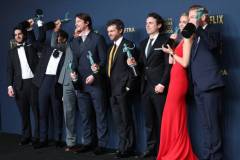 LOS ANGELES, CALIFORNIA - FEBRUARY 24: (L-R) Benny Safdie, Cillian Murphy, Robert Downey Jr., Josh Hartnett, Alden Ehrenreich, Casey Affleck, Emily Blunt and Kenneth Branagh, winner of the Outstanding Performance by a Cast in a Motion Picture award for 'Oppenheimer' pose in the press room during the 30th Annual Screen Actors Guild Awards at Shrine Auditorium and Expo Hall on February 24, 2024 in Los Angeles, California.  (Photo by Monica Schipper/FilmMagic)