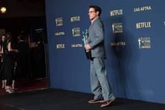 LOS ANGELES, CALIFORNIA - FEBRUARY 24: Robert Downey Jr., winner of the Outstanding Performance by a Male Actor in a Supporting Role award and the Outstanding Performance by a Cast in a Motion Picture award for 'Oppenheimer' poses in the press room during the 30th Annual Screen Actors Guild Awards at Shrine Auditorium and Expo Hall on February 24, 2024 in Los Angeles, California.  (Photo by Monica Schipper/FilmMagic)