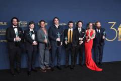 LOS ANGELES, CALIFORNIA - FEBRUARY 24: Benny Safdie, Cillian Murphy, Robert Downey Jr., Josh Hartnett, Alden Ehrenreich, Casey Affleck, Emily Blunt and Kenneth Branagh, winner of the Outstanding Performance by a Cast in a Motion Picture award for 'Oppenheimer' poses at the 30th Annual Screen Actors Guild Awards  at Shrine Auditorium and Expo Hall on February 24, 2024 in Los Angeles, California. (Photo by Steve Granitz/FilmMagic)