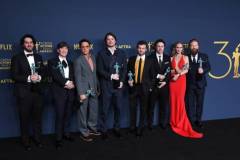 LOS ANGELES, CALIFORNIA - FEBRUARY 24: Benny Safdie, Cillian Murphy, Robert Downey Jr., Josh Hartnett, Alden Ehrenreich, Casey Affleck, Emily Blunt and Kenneth Branagh, winner of the Outstanding Performance by a Cast in a Motion Picture award for 'Oppenheimer' poses at the 30th Annual Screen Actors Guild Awards  at Shrine Auditorium and Expo Hall on February 24, 2024 in Los Angeles, California. (Photo by Steve Granitz/FilmMagic)