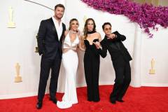 Chris Hemsworth, Elsa Pataky, Susan Downey and Robert Downey Jr. at the 96th Annual Oscars held at at the Ovation Hollywood on March 10, 2024 in Los Angeles, California. (Photo by Gilbert Flores/Variety via Getty Images)