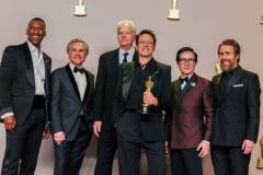 Hollywood, CA - March 10: Actors Mahershala Ali, Christoph Waltz, Tim Robbins, Ke Huy Quan and Sam Rockwell pose with US actor Robert Downey Jr. winner of the Oscar for Best Actor in a Supporting Role for "Oppenheimer," in the deadline room at the 96th Annual Academy Awards at the Dolby Theatre at Hollywood & Highland Center in Hollywood, CA, Sunday, March 10, 2024. (Dania Maxwell / Los Angeles Times via Getty Images)