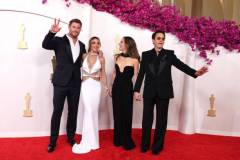 HOLLYWOOD, CALIFORNIA - MARCH 10: (L-R) Chris Hemsworth, Elsa Pataky, Susan Downey, and Robert Downey Jr. attend the 96th Annual Academy Awards on March 10, 2024 in Hollywood, California. (Photo by Kevin Mazur/Getty Images)