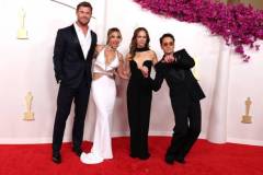HOLLYWOOD, CALIFORNIA - MARCH 10: (L-R) Chris Hemsworth, Elsa Pataky, Susan Downey, and Robert Downey Jr. attend the 96th Annual Academy Awards on March 10, 2024 in Hollywood, California. (Photo by Kevin Mazur/Getty Images)