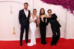 HOLLYWOOD, CALIFORNIA - MARCH 10: (L-R) Chris Hemsworth, Elsa Pataky, Susan Downey and Robert Downey Jr. attend the 96th Annual Academy Awards on March 10, 2024 in Hollywood, California. (Photo by John Shearer/WireImage)
