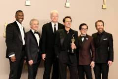 HOLLYWOOD, CALIFORNIA - MARCH 10: (L-R) Mahershala Ali, Christoph Waltz, Tim Robbins, Robert Downey Jr., winner of the Best Actor in a Supporting Role award for ?Oppenheimer?, Ke Huy Quan, and Sam Rockwell pose in the press room during the 96th Annual Academy Awards at Ovation Hollywood on March 10, 2024 in Hollywood, California. (Photo by Arturo Holmes/Getty Images)