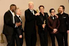 HOLLYWOOD, CALIFORNIA - MARCH 10: (L-R) Mahershala Ali, Christoph Waltz, Tim Robbins, Robert Downey Jr., winner of the Best Actor in a Supporting Role award for ?Oppenheimer?, Ke Huy Quan, and Sam Rockwell pose in the press room during the 96th Annual Academy Awards at Ovation Hollywood on March 10, 2024 in Hollywood, California. (Photo by Arturo Holmes/Getty Images)