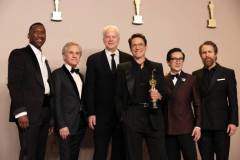HOLLYWOOD, CALIFORNIA - MARCH 10: (L-R) Mahershala Ali, Christoph Waltz, Tim Robbins, Robert Downey Jr., winner of the Best Actor in a Supporting Role award for ?Oppenheimer?, Ke Huy Quan, and Sam Rockwell pose in the press room during the 96th Annual Academy Awards at Ovation Hollywood on March 10, 2024 in Hollywood, California. (Photo by John Shearer/WireImage)