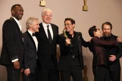 HOLLYWOOD, CALIFORNIA - MARCH 10: (L-R) Mahershala Ali, Christoph Waltz, Tim Robbins, Robert Downey Jr., winner of the Best Actor in a Supporting Role award for ?Oppenheimer?, Ke Huy Quan, and Sam Rockwell pose in the press room during the 96th Annual Academy Awards at Ovation Hollywood on March 10, 2024 in Hollywood, California. (Photo by John Shearer/WireImage)