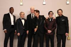 HOLLYWOOD, CALIFORNIA - MARCH 10: (L-R) Mahershala Ali, Christoph Waltz, Tim Robbins, Robert Downey Jr., winner of the Best Actor in a Supporting Role award for ?Oppenheimer?, Ke Huy Quan, and Sam Rockwell pose in the press room during the 96th Annual Academy Awards at Ovation Hollywood on March 10, 2024 in Hollywood, California. (Photo by John Shearer/WireImage)