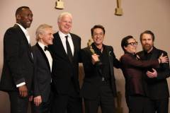 HOLLYWOOD, CALIFORNIA - MARCH 10: (L-R) Mahershala Ali, Christoph Waltz, Tim Robbins, Robert Downey Jr., winner of the Best Actor in a Supporting Role award for ?Oppenheimer?, Ke Huy Quan, and Sam Rockwell pose in the press room during the 96th Annual Academy Awards at Ovation Hollywood on March 10, 2024 in Hollywood, California. (Photo by John Shearer/WireImage)