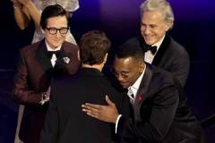 HOLLYWOOD, CALIFORNIA - MARCH 10: Robert Downey Jr. (2nd L) accepts the Best Actor in a Supporting Role for "Oppenheimer" from Ke Huy Quan, Mahershala Ali, and Christoph Waltz onstage during the 96th Annual Academy Awards at Dolby Theatre on March 10, 2024 in Hollywood, California. (Photo by Kevin Winter/Getty Images)