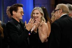 HOLLYWOOD, CALIFORNIA - MARCH 10: (L) Robert Downey Jr., winner of the Best Actor in a Supporting Role and Producer, Charles Roven (R), winner of the Best Picture award for 'Oppenheimer,' attend the Governors Ball during the 96th Annual Academy Awards at Dolby Theatre on March 10, 2024 in Hollywood, California. (Photo by Mike Coppola/Getty Images)