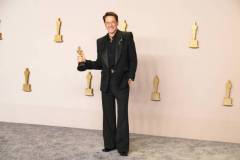 HOLLYWOOD, CALIFORNIA - MARCH 10: Robert Downey Jr., winner of the Best Actor in a Supporting Role award for ?Oppenheimer?, pose in the press room during the 96th Annual Academy Awards at Ovation Hollywood on March 10, 2024 in Hollywood, California. (Photo by Jeff Kravitz/FilmMagic)