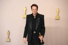 HOLLYWOOD, CALIFORNIA - MARCH 10: Robert Downey Jr., winner of the Best Actor in a Supporting Role award for ?Oppenheimer?, pose in the press room during the 96th Annual Academy Awards at Ovation Hollywood on March 10, 2024 in Hollywood, California. (Photo by Jeff Kravitz/FilmMagic)
