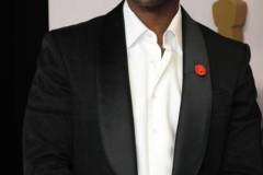 HOLLYWOOD, CALIFORNIA - MARCH 10: (L-R) Mahershala Ali poses in the press room during the 96th Annual Academy Awards at Ovation Hollywood on March 10, 2024 in Hollywood, California. (Photo by Jeff Kravitz/FilmMagic)