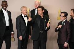 HOLLYWOOD, CALIFORNIA - MARCH 10: (L-R) Mahershala Ali, Christoph Waltz, Tim Robbins, Robert Downey Jr., winner of the Best Actor in a Supporting Role award for ?Oppenheimer?, Ke Huy Quan, and Sam Rockwell pose in the press room during the 96th Annual Academy Awards at Ovation Hollywood on March 10, 2024 in Hollywood, California. (Photo by Jeff Kravitz/FilmMagic)