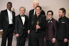 HOLLYWOOD, CALIFORNIA - MARCH 10: (L-R) Mahershala Ali, Christoph Waltz, Tim Robbins, Robert Downey Jr., winner of the Best Actor in a Supporting Role award for ?Oppenheimer?, Ke Huy Quan, and Sam Rockwell pose in the press room during the 96th Annual Academy Awards at Ovation Hollywood on March 10, 2024 in Hollywood, California. (Photo by Jeff Kravitz/FilmMagic)