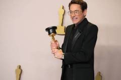 HOLLYWOOD, CALIFORNIA - MARCH 10: Robert Downey Jr., winner of the Best Actor in a Supporting Role award for ?Oppenheimer?, onstage in the press room at the 96th Annual Academy Awards at Ovation Hollywood on March 10, 2024 in Hollywood, California. (Photo by Jeff Kravitz/FilmMagic)