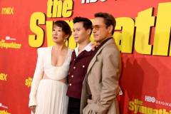 LOS ANGELES, CALIFORNIA - APRIL 09: (L-R) Sandra Oh, Hoa Xuande, and Robert Downey Jr. attend HBO's "The Sympathizer" Red Carpet Premiere Event at Paramount Theater on April 09, 2024 in Los Angeles, California.  (Photo by FilmMagic/FilmMagic for HBO)