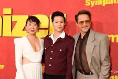 LOS ANGELES, CALIFORNIA - APRIL 09: (L-R) Sandra Oh, Hoa Xuande, and Robert Downey Jr. attend HBO's "The Sympathizer" Red Carpet Premiere Event at Paramount Theater on April 09, 2024 in Los Angeles, California.  (Photo by FilmMagic/FilmMagic for HBO)